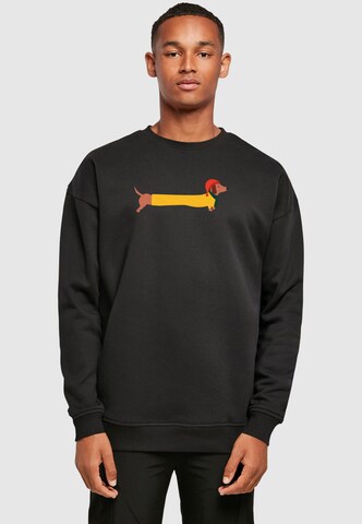 Merchcode Sweatshirt 'Christmas Dog' in Schwarz: Vorderseite