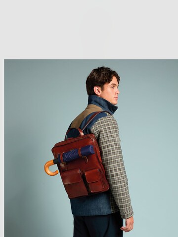 The Bridge Backpack in Brown: front
