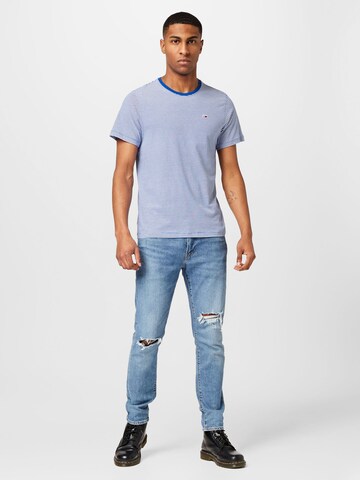 Tommy Jeans قميص بلون أزرق