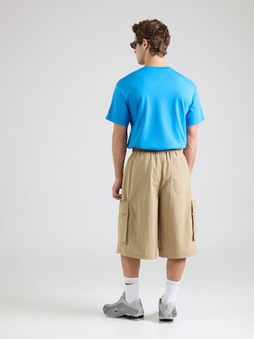Loosefit Pantaloni 'CLUB' di Nike Sportswear in beige