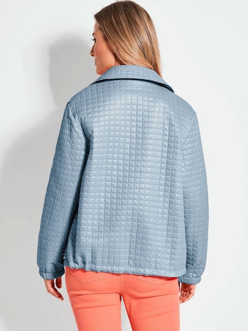 Goldner Jacke in Blau