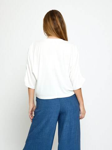 Top 'Triniti' di minus in bianco