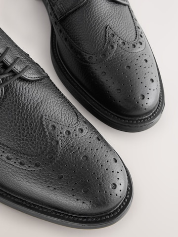 Chaussure à lacets Next en noir