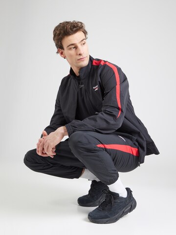 Reebok Tapered Sports trousers in Black