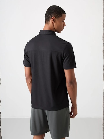 Tommy Life Performance shirt in Black