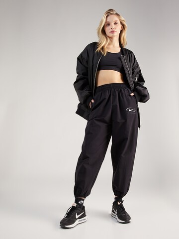 Nike Sportswear Дънки Tapered Leg Панталон в черно