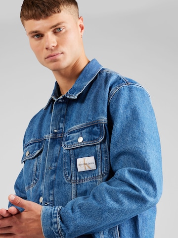 Calvin Klein Jeans Tussenjas 'Regular90's' in Blauw