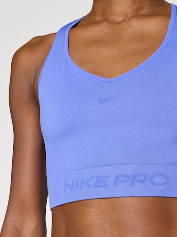 NIKE Sporttop in Lila