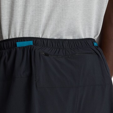 Loosefit Pantaloni sportivi 'RC Essential Short 5"' di new balance in nero
