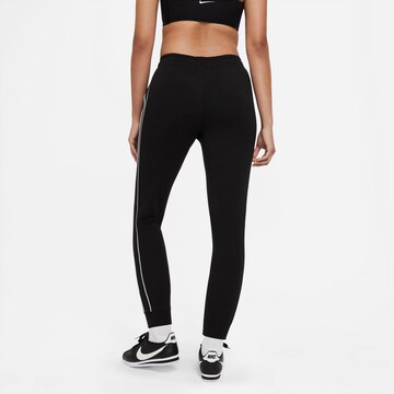 Effilé Pantalon Nike Sportswear en noir