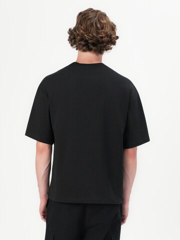 ALPHA INDUSTRIES T-Shirt 'Studio Edition' in Schwarz