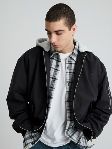 NoWear Between-Season Jacket in Black: front