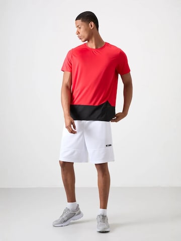 T-Shirt fonctionnel Tommy Life en rouge