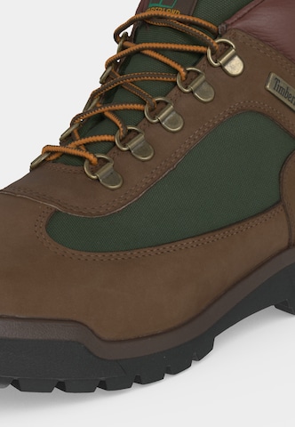 TIMBERLAND Boots med snörning i brun