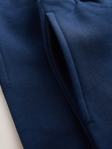 Next Tapered Byxa i blå