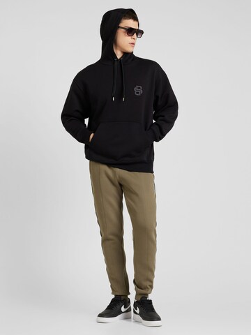 Effilé Pantalon 'Mickey' GUESS en vert