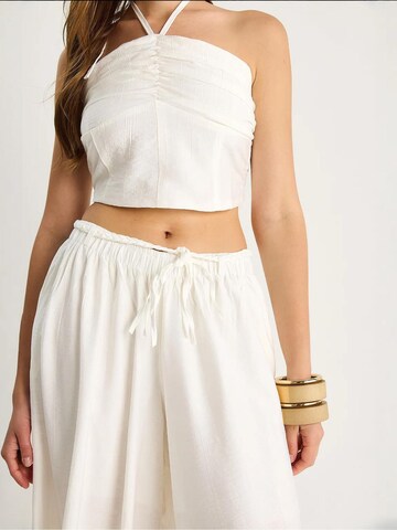 Pantalons de tailleur Bianco Lucci en blanc