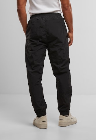 regular Pantaloni di Karl Kani in nero