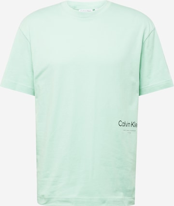 Tricou 'OFF PLACEMENT' de la Calvin Klein pe verde: față