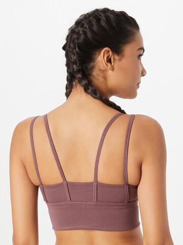 PUMA - Soutien Bustier Soutien de desporto em roxo