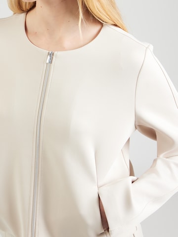 COMMA Přechodná bunda – béžová