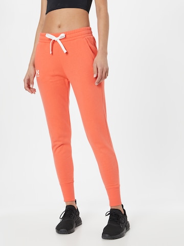 UNDER ARMOUR Tapered Workout Pants 'Rival' in Orange: front