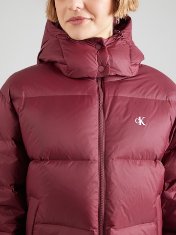 Calvin Klein Jeans Zimní bunda 'Essential' – červená