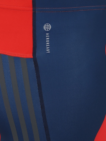 Skinny Pantaloni sport 'Marimekko Run Icons 3-Stripes ' de la ADIDAS SPORTSWEAR pe roșu