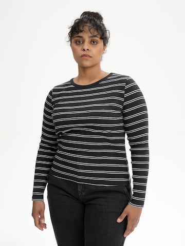MELA T-shirt 'MEHAR' i svart