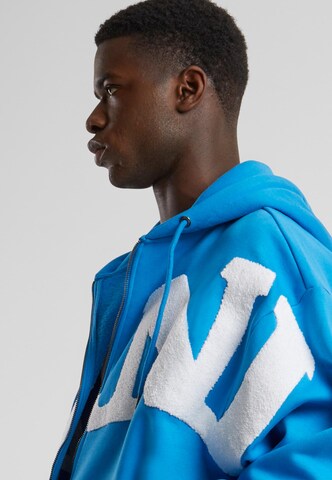 Giacca di felpa 'Wavy Retro' di Karl Kani in blu