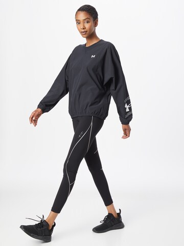 UNDER ARMOUR Sports sweatshirt in Black