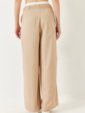 Wide Leg Pantalon à pince Bianco Lucci en beige
