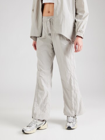 Nike Sportswear Loose fit Trousers in Grey: front