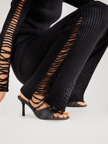 ABOUT YOU x Chiara Biasi Flared Pants 'Delphine' in Black