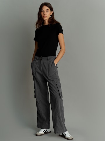 Next - Pierna ancha Pantalón en negro