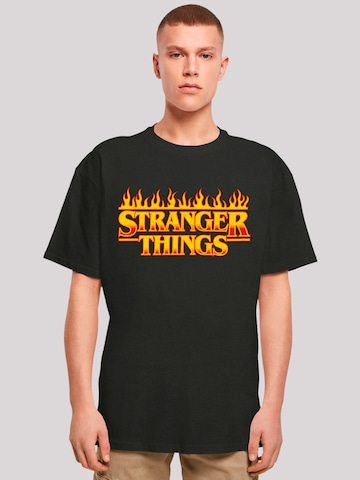 F4NT4STIC Shirt 'Stranger Things Fire Logo Netflix TV Series' in Black: front