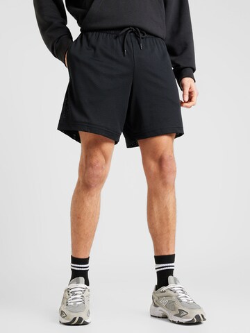 new balance Regular Trousers in Black: front