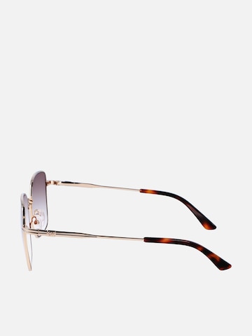 Occhiali da sole di Calvin Klein in oro