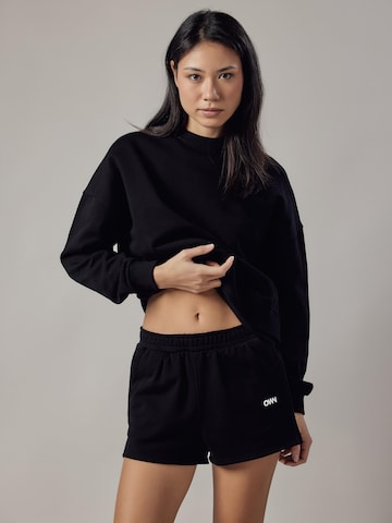 Pantaloni di OWN Off With Nature in nero: frontale