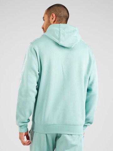 Nike Sportswear Trenirka za tek 'CLUB FLEECE' | modra barva