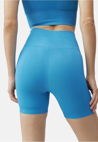 Skinny Pantalon de sport 'Urdhva' Born Living Yoga en bleu