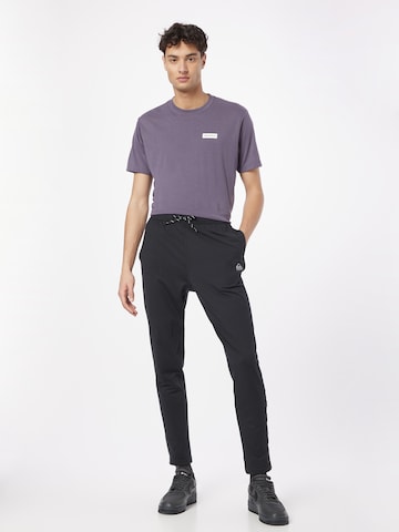 Slimfit Pantaloni sportivi di QUIKSILVER in nero