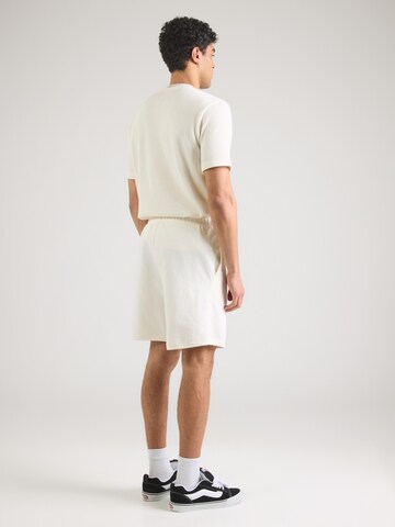 Champion Authentic Athletic Apparel - Loosefit Calças em amarelo