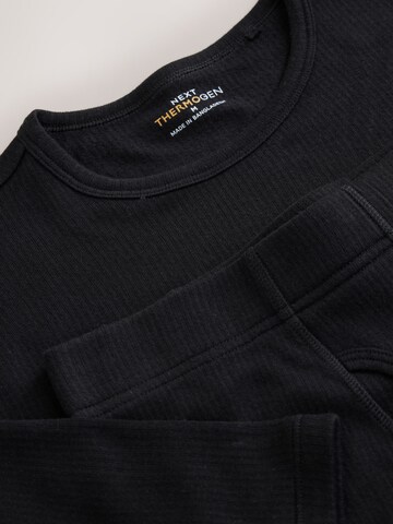 Next - Camiseta térmica en negro