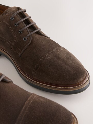 Next Veterschoen in Bruin