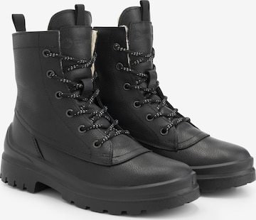 Travelin Lace-Up Boots in Black