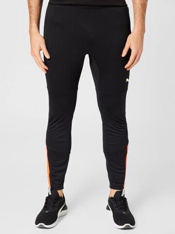 PUMA Slim fit Workout Pants in Black: front