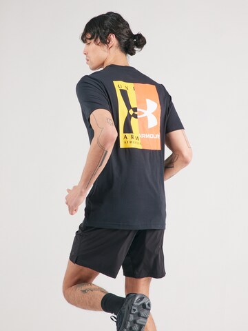 Tricou funcțional de la UNDER ARMOUR pe negru: față