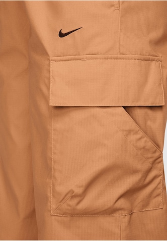Loosefit Pantaloni sportivi 'Essential' di NIKE in marrone