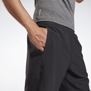 Regular Pantaloni sport de la Reebok pe negru